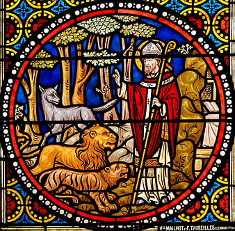 Stained glass window depicting Saint Austremonius with animals