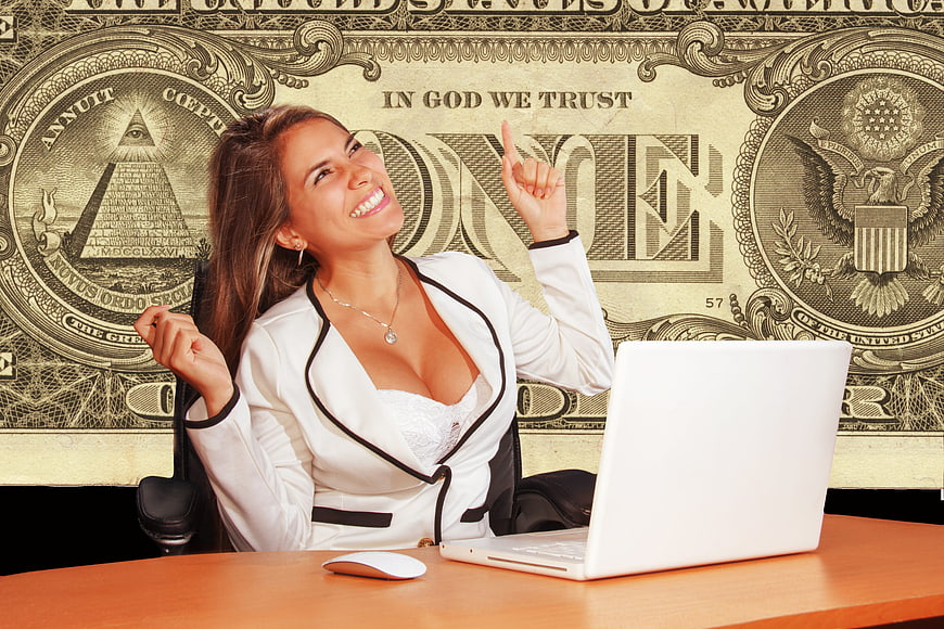 Happy businesswoman celebrating success with laptop and money background