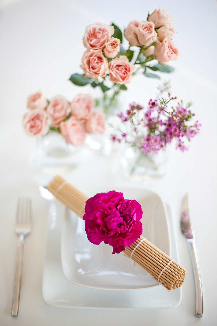 Elegant Pink Rose Table Setting with Magenta Carnation Napkin Ring