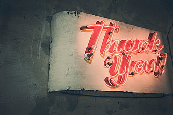 Retro Red Neon Thank You Sign on Concrete Wall