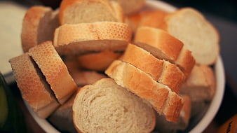 Sliced Baguette Bread in White Bowl