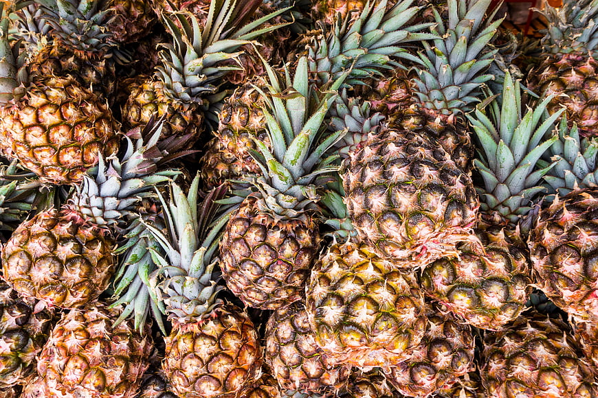 Top View of Fresh Pineapples Piled Together