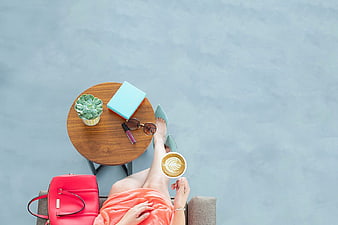 Top View Woman Relaxing with Coffee and Accessories