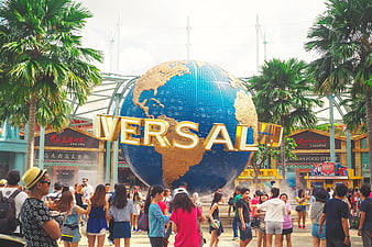 Crowd of tourists at the Universal Studios Singapore globe entrance