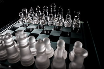 Glass Chess Set on Black and White Board