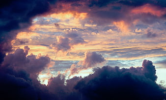 Dramatic sunset sky with colorful clouds and golden light