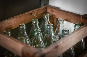 Vintage Green Glass Bottles in Wooden Crate