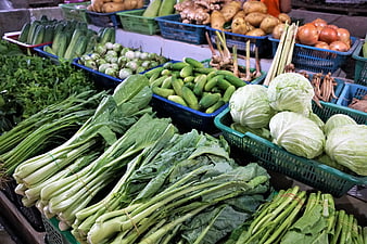 Fresh Asian Vegetables Displayed In Market Baskets