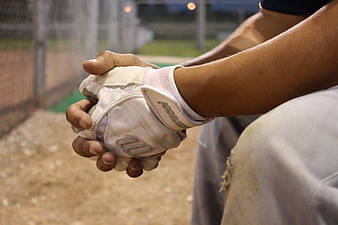 Close-up of Baseball Player Holding Glove at Night