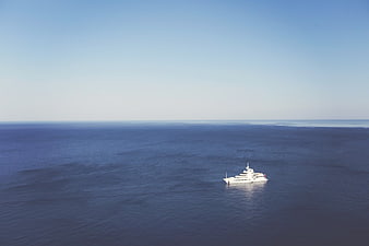 Aerial View of White Luxury Yacht on Blue Ocean