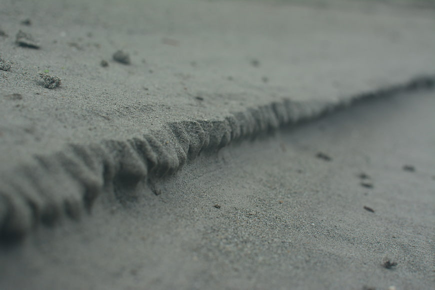 Close-up of textured sand ripples on a beach