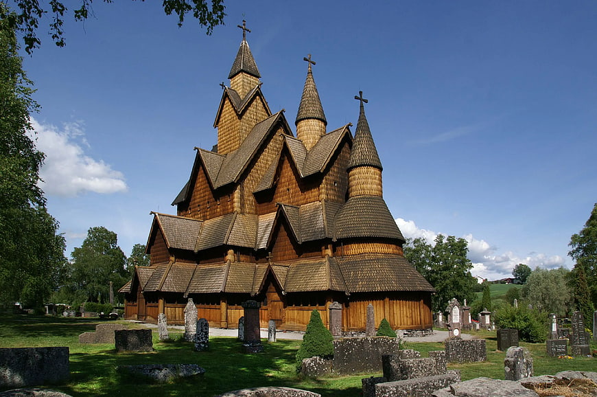Historic Wooden Stave Church in Norwegian Landscape