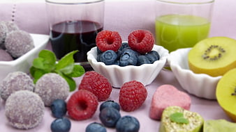 Healthy Breakfast Spread With Fresh Berries, Kiwi, And Juices