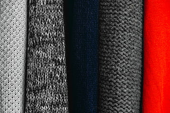 Vertical stripes of colorful knitted sweater fabrics