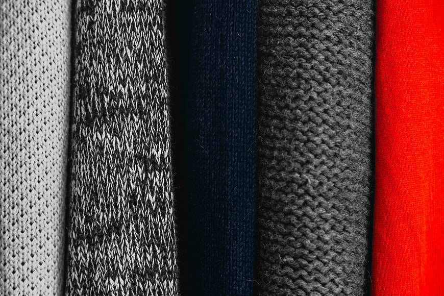 Vertical stripes of colorful knitted sweater fabrics