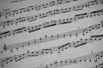 Close-up of classical sheet music with musical notes and staves