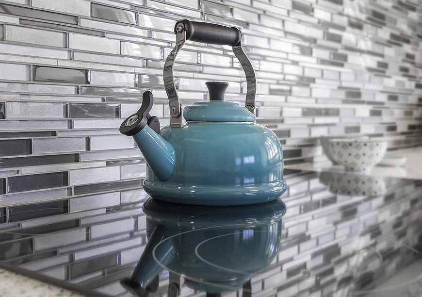 Blue Kettle on Modern Glass Tile Kitchen Backsplash