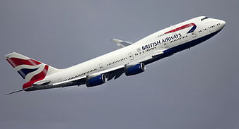 British Airways Boeing 747 Airplane Taking Off Against Gray Sky