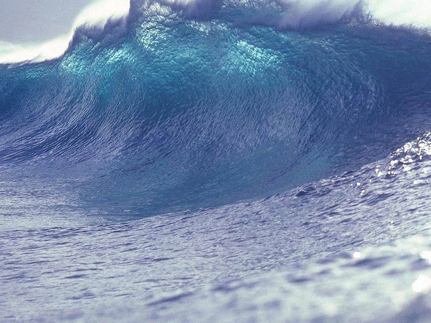 Powerful Blue Ocean Wave Curling with White Foam