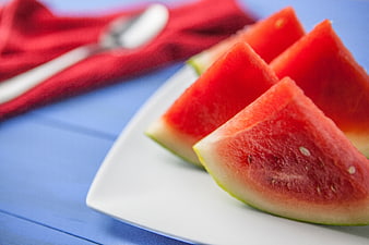 Fresh Watermelon Slices on White Plate with Red Napkin