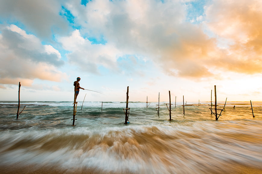 Stilt Fisherman at Sunset in the Ocean