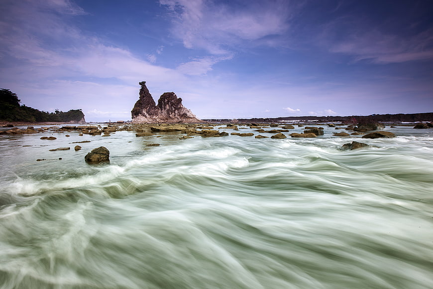 Long Exposure Coastal Landscape with Rock Formation and Silky Waves