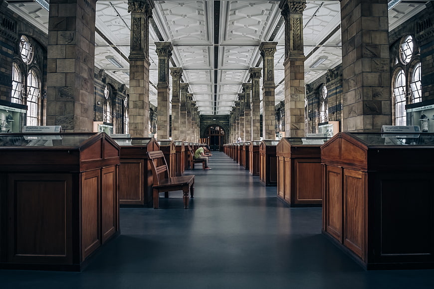 Symmetrical Interior of Historic Museum Hall with Stone Columns