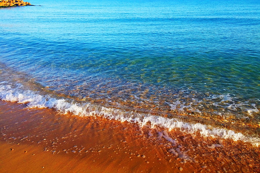 Crystal Clear Turquoise Sea Waves on Sandy Beach