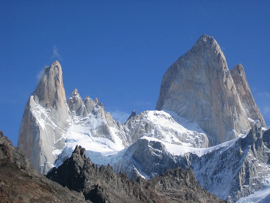 Majestic Fitz Roy Mountain Peaks with Snow and Blue Sky