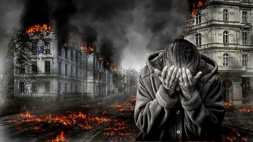 Desperate Person Amidst Burning City Destruction and War