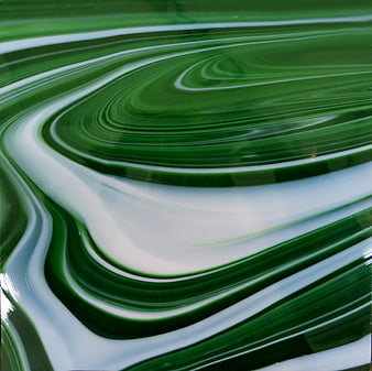 Abstract Green and White Swirled Glass Texture