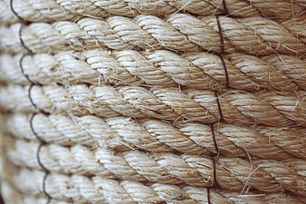Close-up texture of thick twisted natural rope