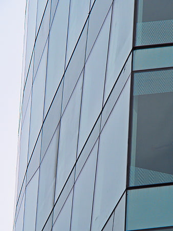 Modern Glass Building Facade with Blue Tinted Windows
