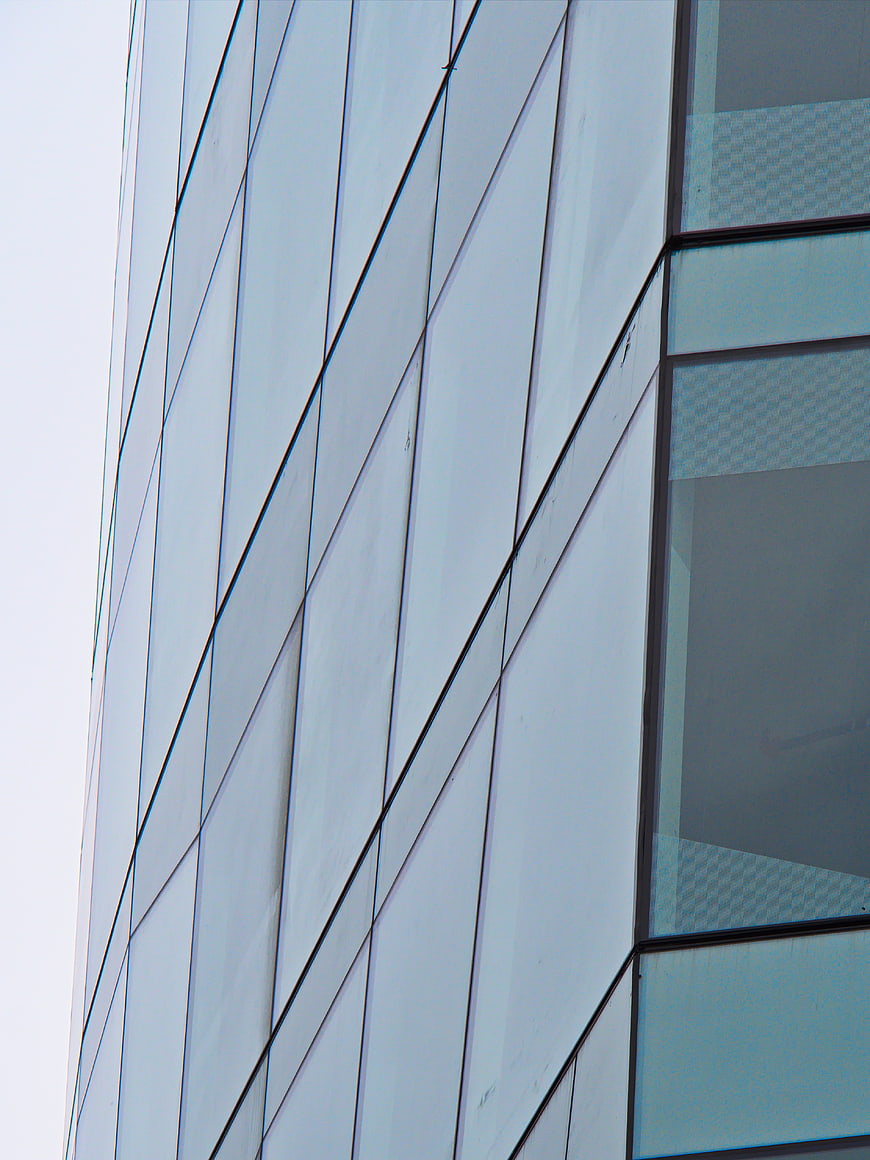 Modern Glass Building Facade with Blue Tinted Windows