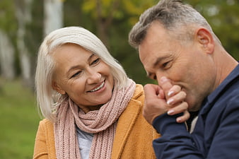 Happy senior couple sharing affectionate moment outdoors