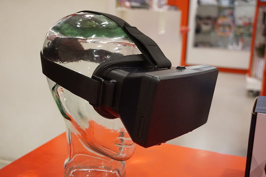 Black VR Headset on Clear Glass Mannequin Head