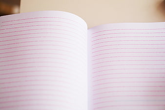 Open Book with Blurred Text and Shallow Depth of Field