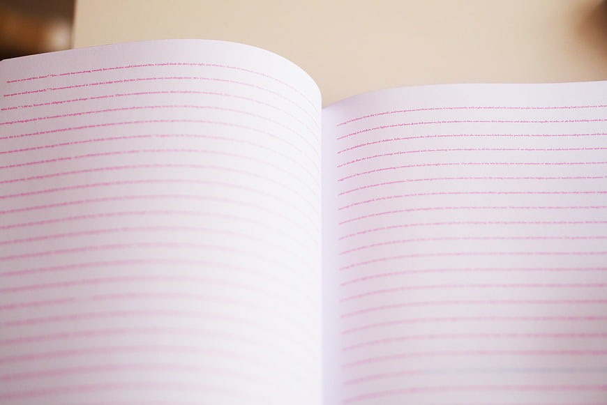 Open Book with Blurred Text and Shallow Depth of Field