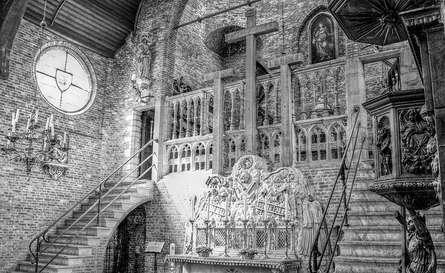 Interior of Gothic Church in Bruges with Altar and Crosses