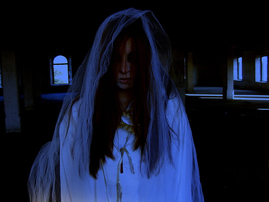 Scary ghost bride in abandoned building