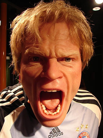 Angry screaming man in football jersey close-up