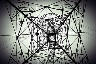 Low angle view of high voltage electricity pylon structure