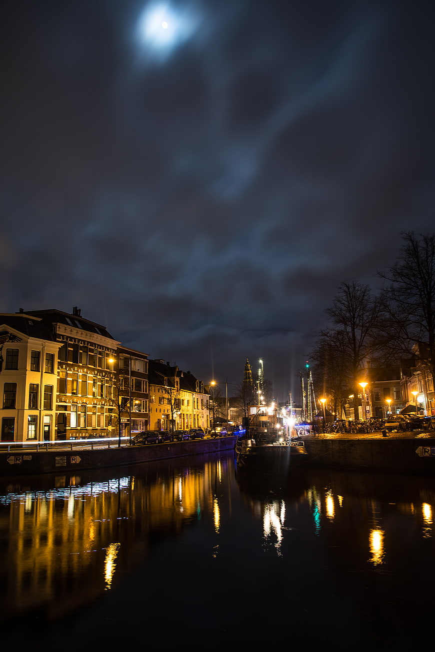 Moonlit canal in Groningen with reflections and winter atmosphere