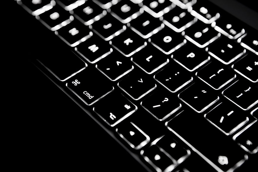 Close-up of Backlit Black Mac Keyboard
