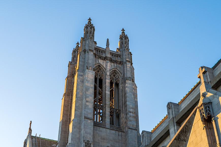 Gothic church tower against blue sky