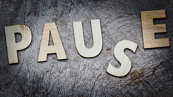 Wooden Pause Letters On Rustic Dark Wood Background