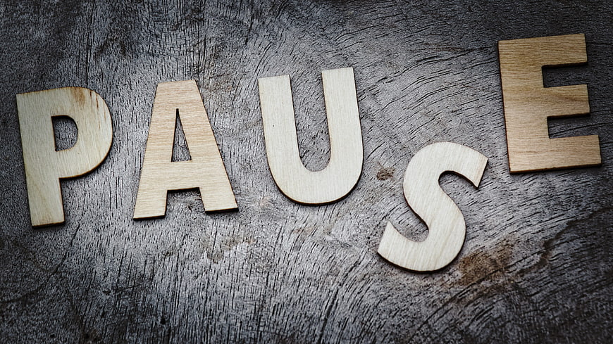Wooden Pause Letters On Rustic Dark Wood Background