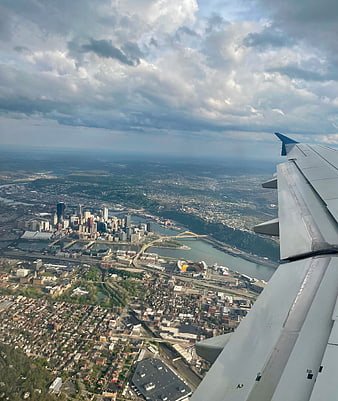 Aerial View of Pittsburgh Skyline from Airplane Window