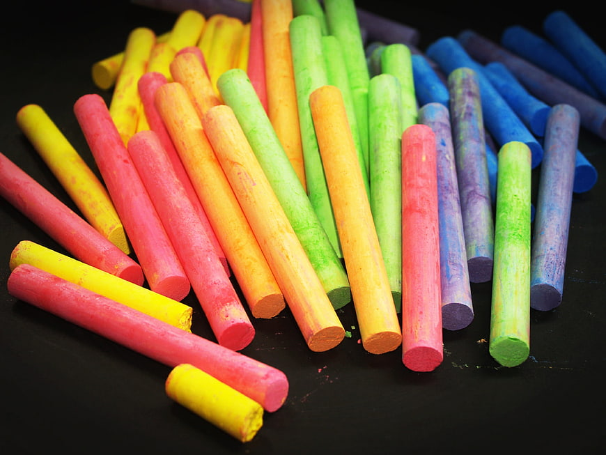 Colorful Chalk Sticks on Black Background