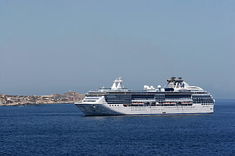 White Cruise Ship Sailing on Blue Sea
